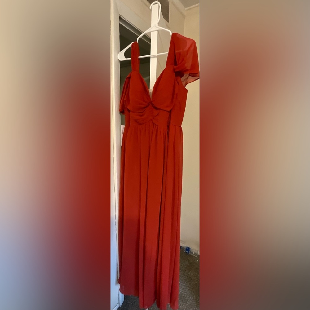 Bridesmaid dress.Dress still has tags. Never worn no alterations done.